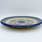 UNIKAT Happy Hydrangea plate, front view showing hydrangea ring and blue mosaic border