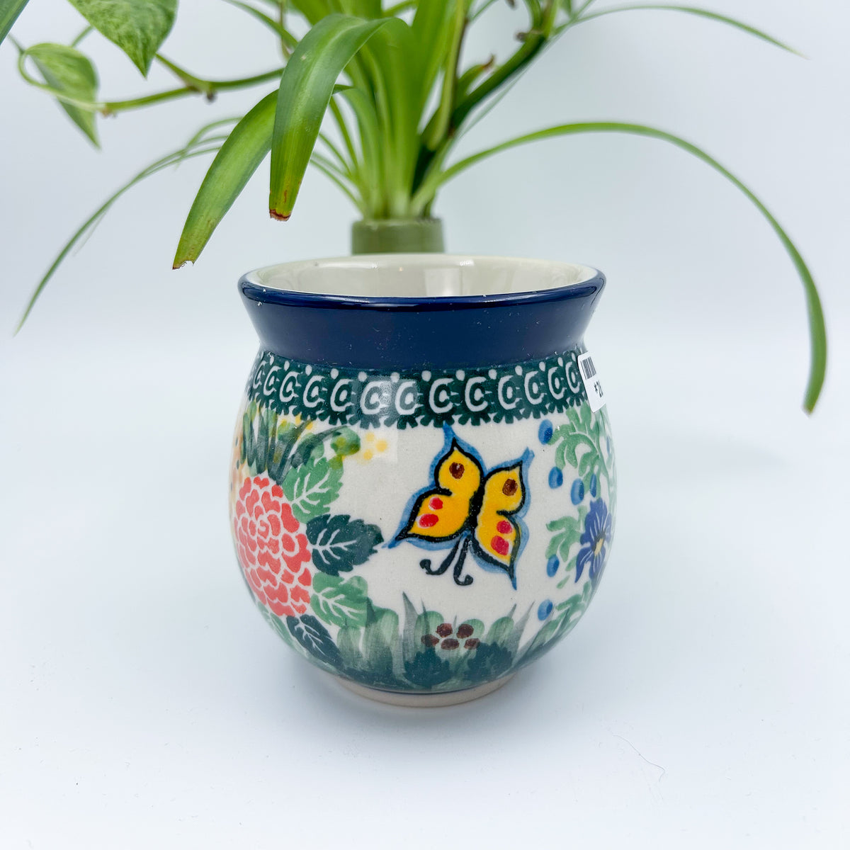 Spring Garden bubble mug on white background, straight-on view showing butterfly
