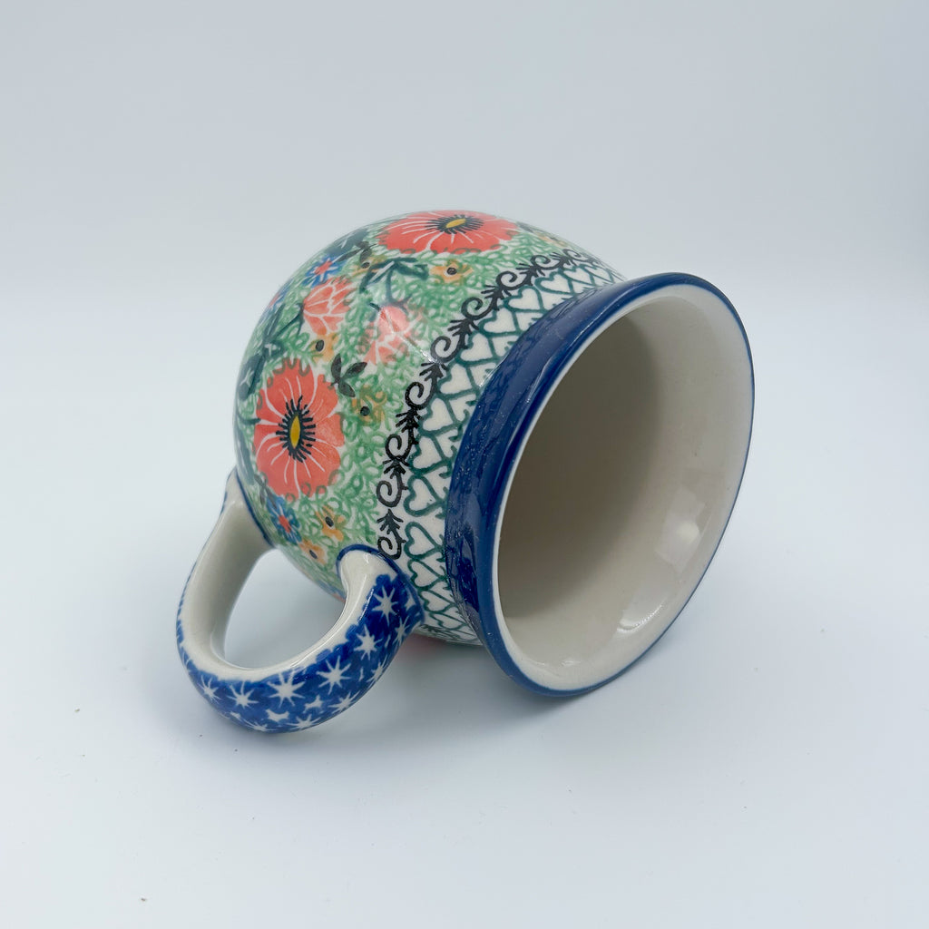 Poppy Parade bubble mug tipped on its side showing interior and pattern