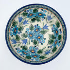 Evangeline bowl on white background, top-down straight-on view