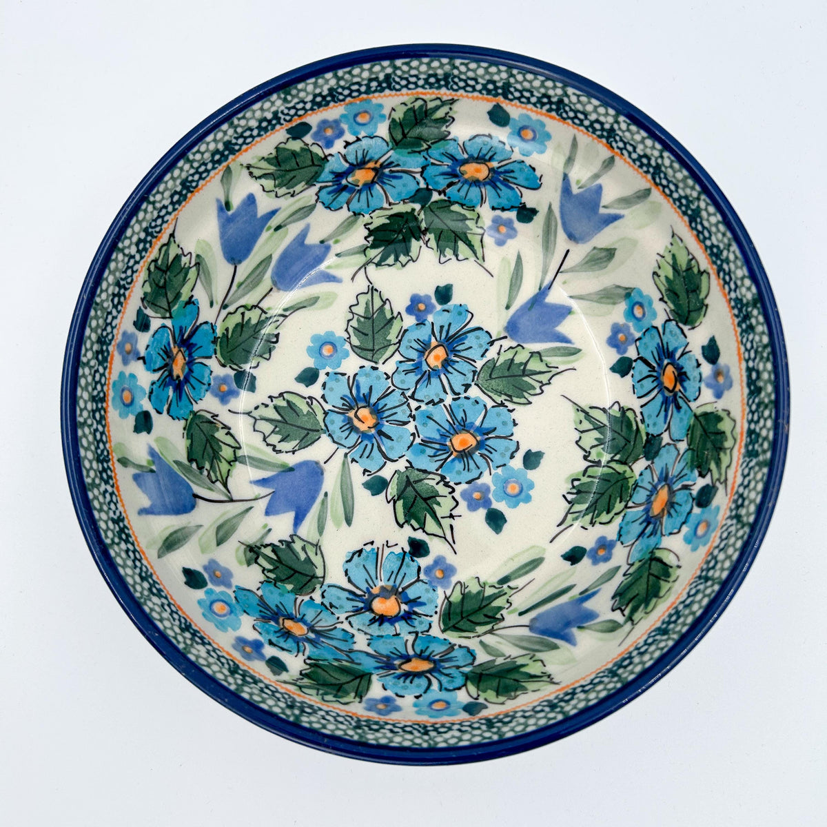 Evangeline bowl on white background, top-down straight-on view