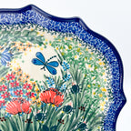 UNIKAT Dragonfly Bounty 8 point platter, close-up view of dragonfly and scalloped rim showing garden pattern