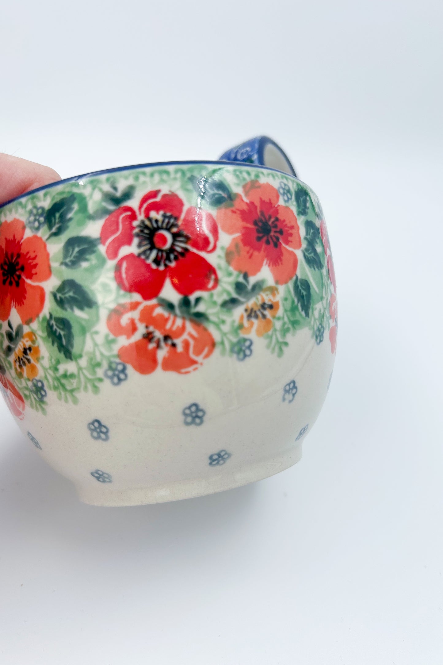 Polish pottery 16oz bowl with loop handle in the UNIKAT Candy Red Poppy pattern. It holds 16 oz of fluid.
Ceramika Artystyczna Company