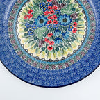 UNIKAT Splendid Meadow plate, close-up angled view of floral bouquet center and mosaic rim