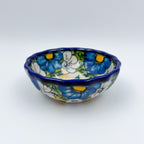 Blue Petal Dance scalloped bowl on white background, front view