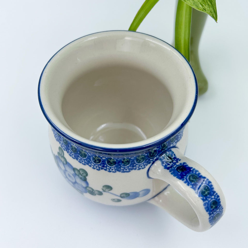 16 oz blue floral Polish Pottery bubble mug is made by talented artisans from Poland.