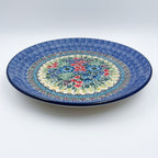 UNIKAT Splendid Meadow plate, front view showing red and blue floral bouquet and mosaic border