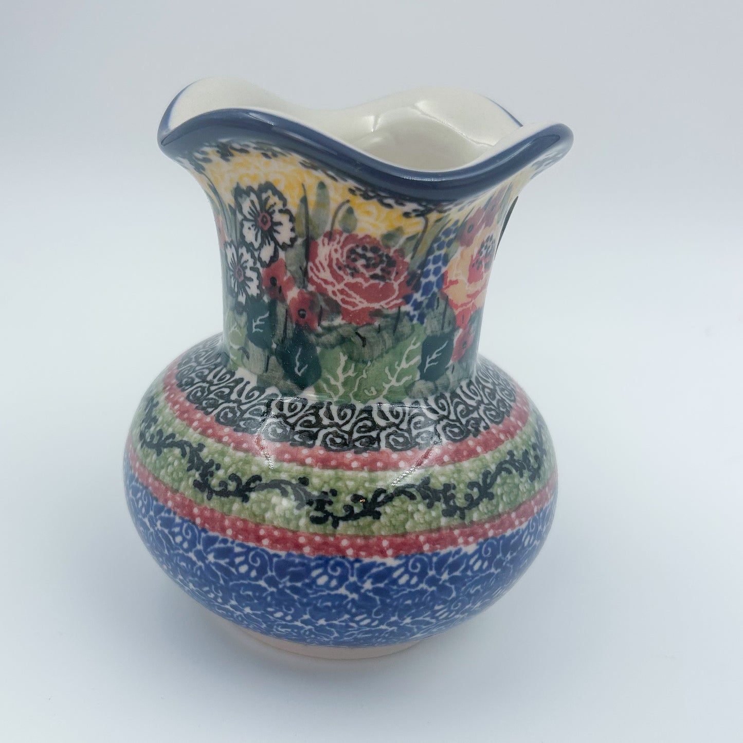 This 4” floral vase is a handmade by talented Polish artisans. This is a Polish UNIKAT signature vase.Dimensions 4.33 X 3.35 X 3.35
Ceramika Artystyczna Company
