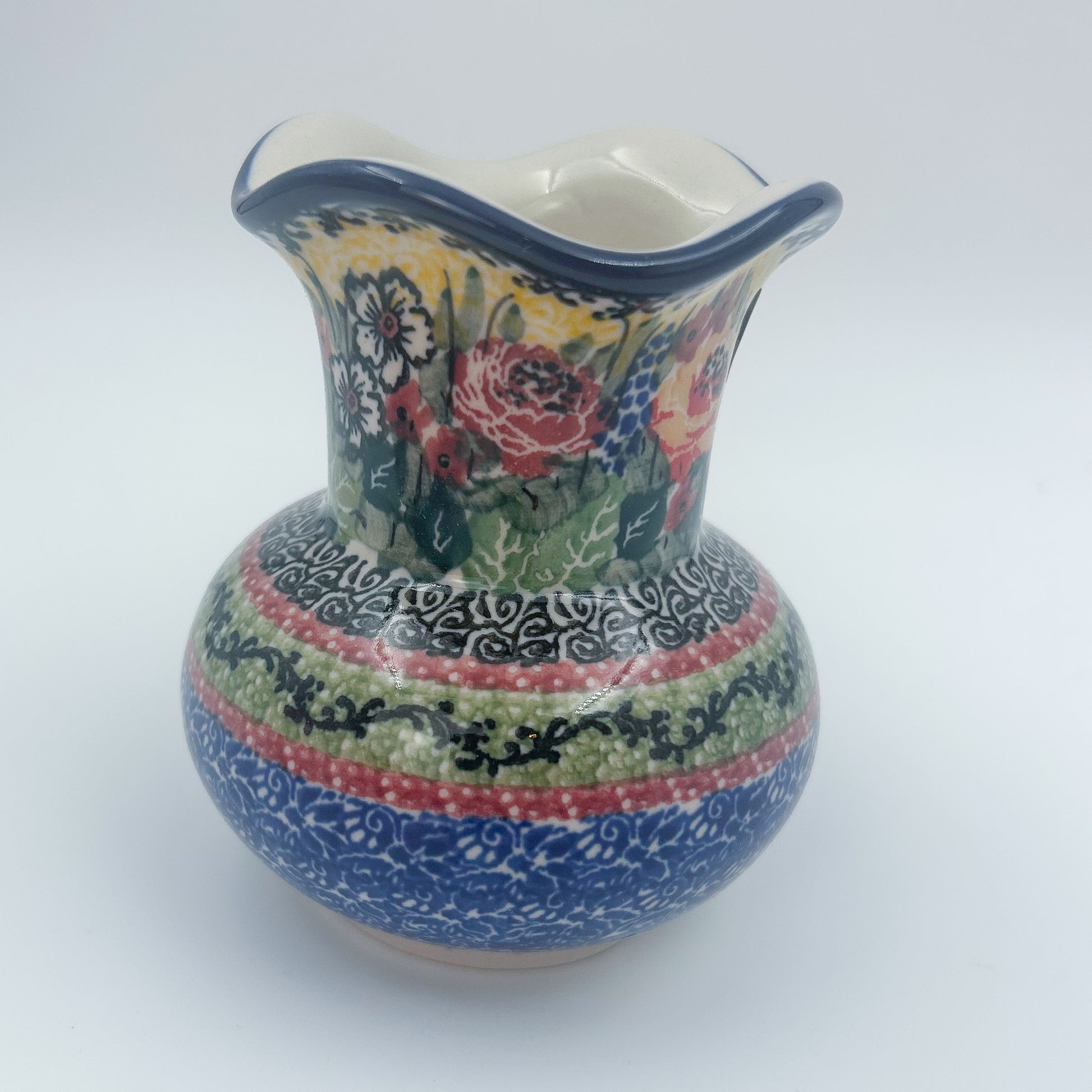 This 4” floral vase is a handmade by talented Polish artisans. This is a Polish UNIKAT signature vase.Dimensions 4.33 X 3.35 X 3.35
Ceramika Artystyczna Company