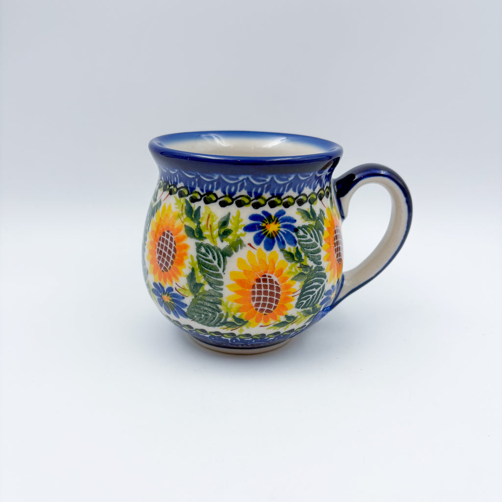 Fall Sunflower bubble mug on white background, angled view with handle