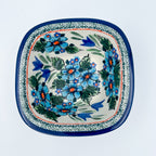 Evangeline square bowl on white background, top-down straight-on view