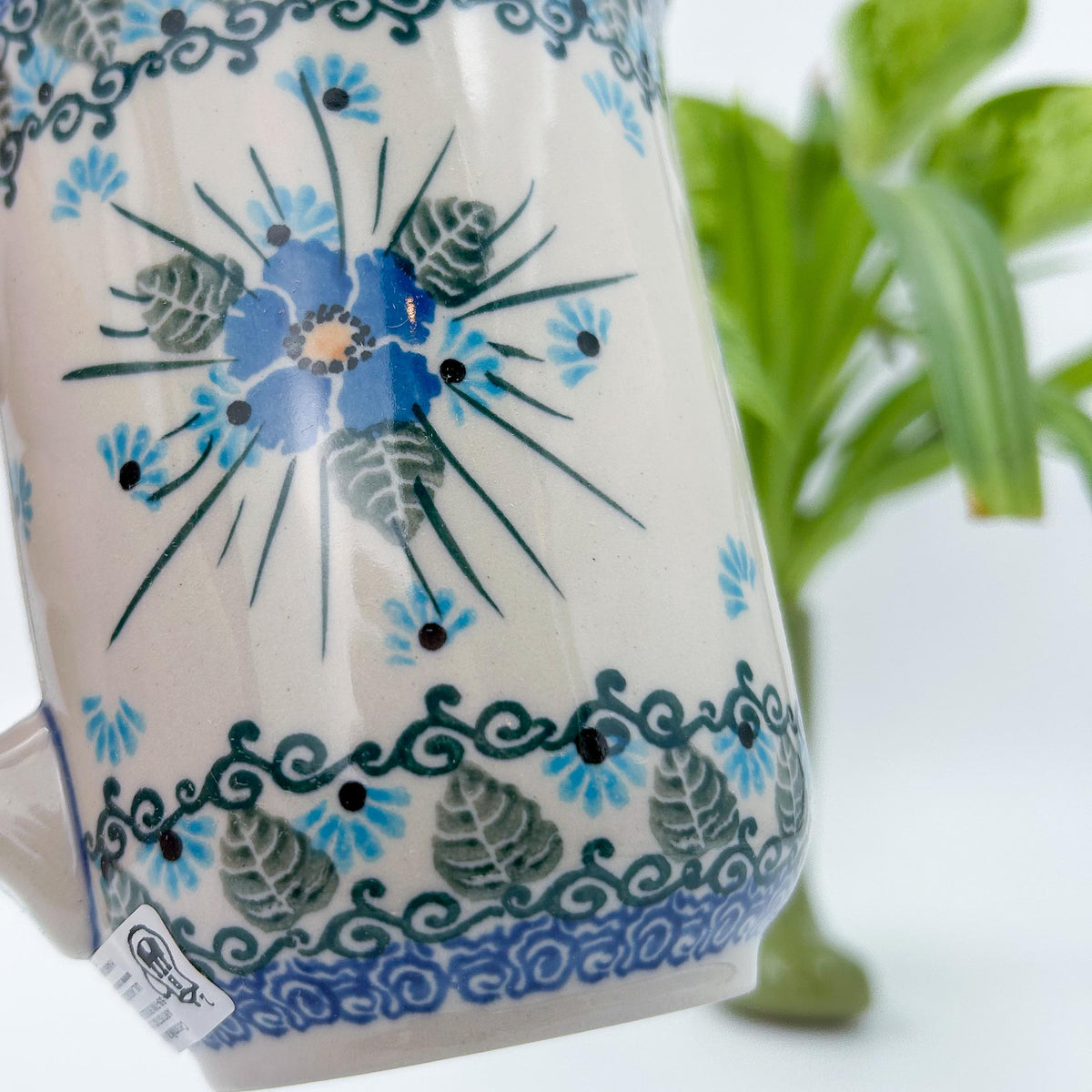 Close-up angled view of Forget Me Not floral medallion pattern