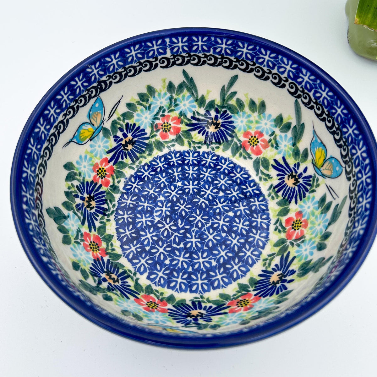 Butterfly Flower Bed deep bowl, top-down view showing butterflies and dotted center