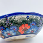 Forget Me Not Pansy handled bowl, angled side view showing exterior floral pattern