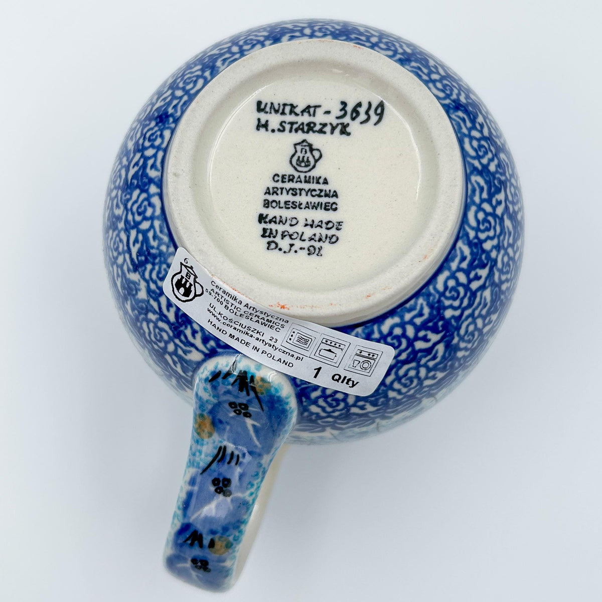 Bottom of Deep Winter bubble mug showing Unikat stamp and artist signature H. Starzyk