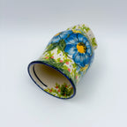 Blue Poppy Dance tulip mug tipped on its side showing interior and pattern