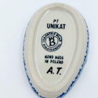 This 5” blue floral spoon rest is a handmade by talented Polish artisans. This is a Polish UNIKAT Bold Blue Poppies pattern 
Dimensions 5” x 3.54"
Ceramika BonaCompany