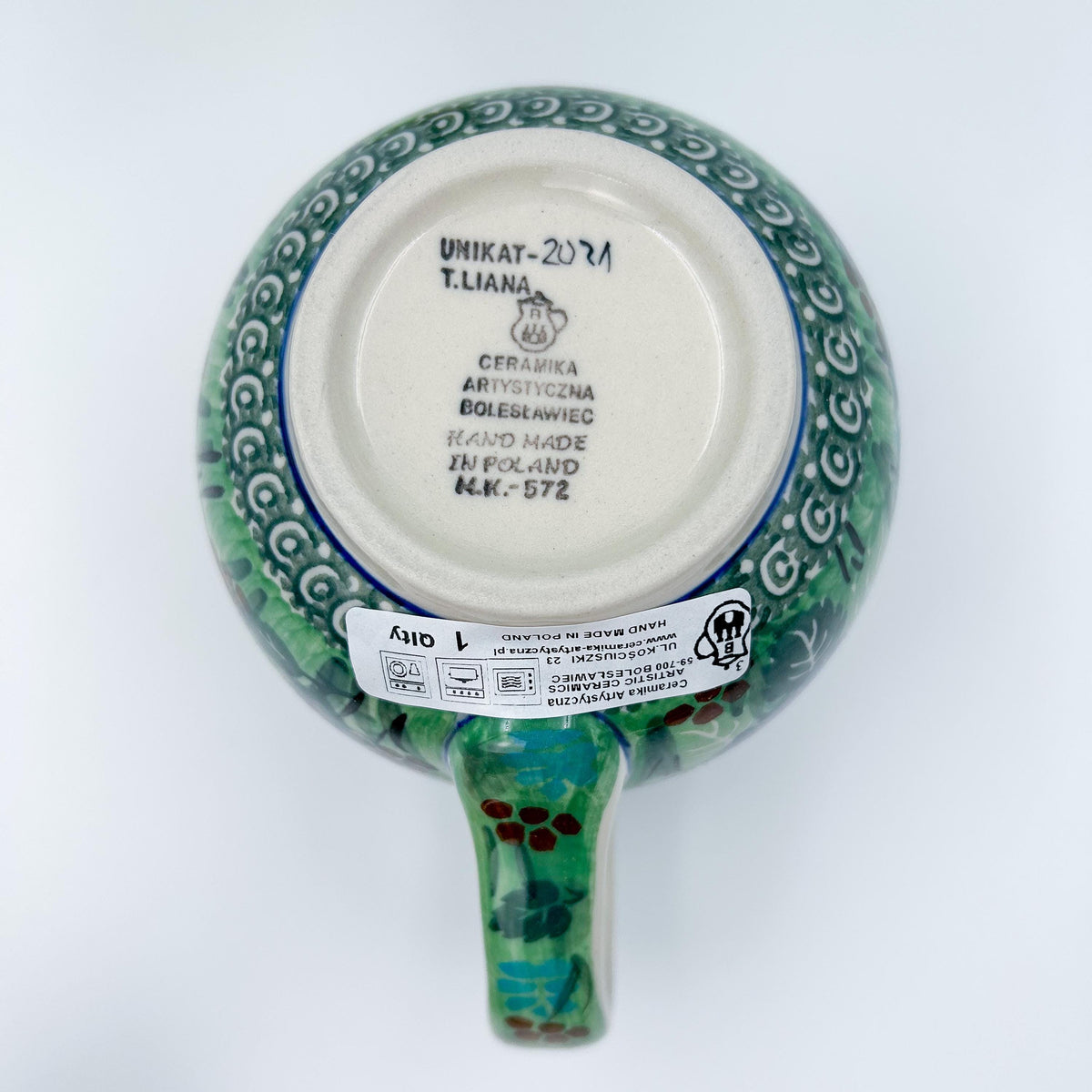 Bottom of Garden Delight bubble mug showing Unikat stamp and artist signature