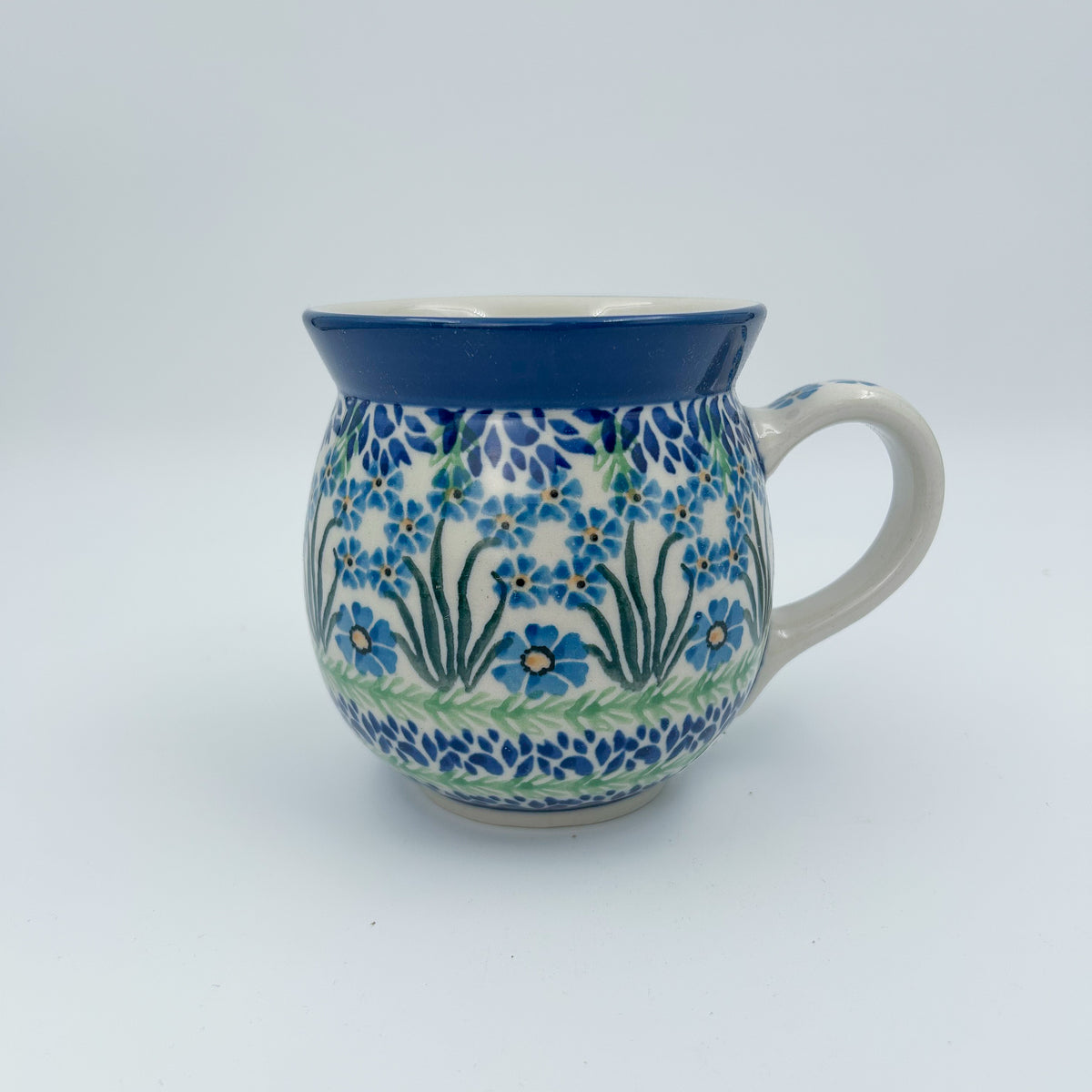 16 oz Polish Pottery bubble mug is made by talented artisans from Poland Blue April Showers Design.  Ceramika Bona Company