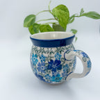 12 oz Polish Pottery UNIKAT bubble mug is made by talented artisans from Poland UNIKAT Fields of Blue Design. Ceramika Artystyczna Company