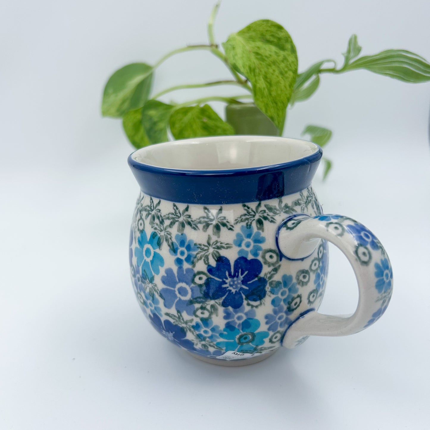 12 oz Polish Pottery UNIKAT bubble mug is made by talented artisans from Poland UNIKAT Fields of Blue Design. Ceramika Artystyczna Company