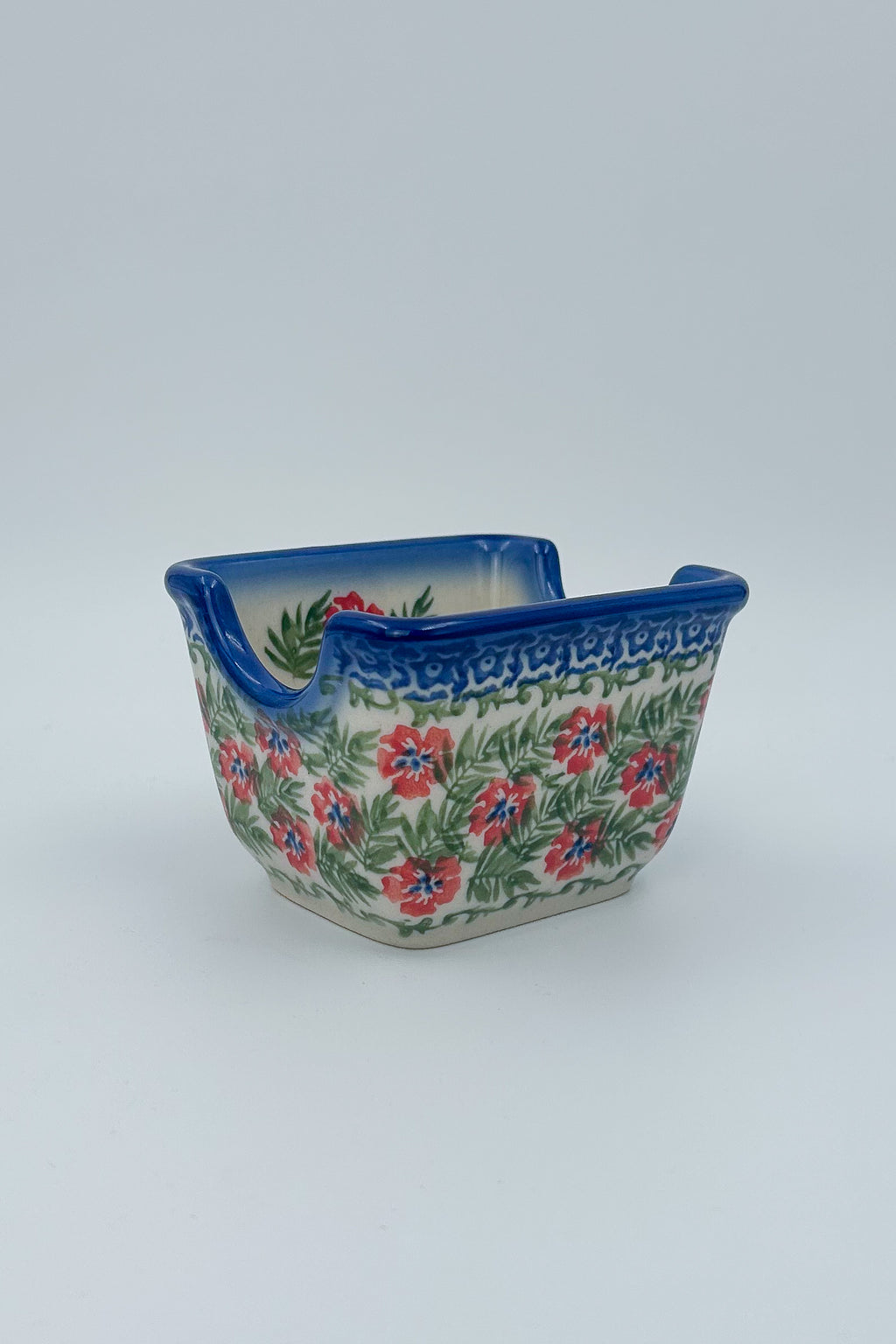 Polish pottery hand made  3” rectangular sugar packet holder in Happiness Pattern.
Ceramika Bona Company