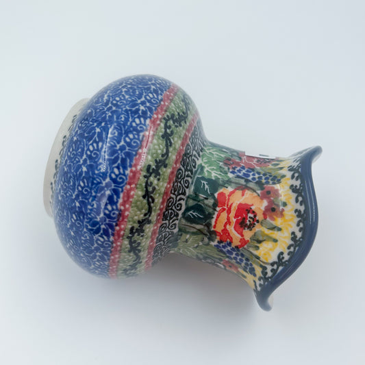 This 4” floral vase is a handmade by talented Polish artisans. This is a Polish UNIKAT signature vase.Dimensions 4.33 X 3.35 X 3.35
Ceramika Artystyczna Company