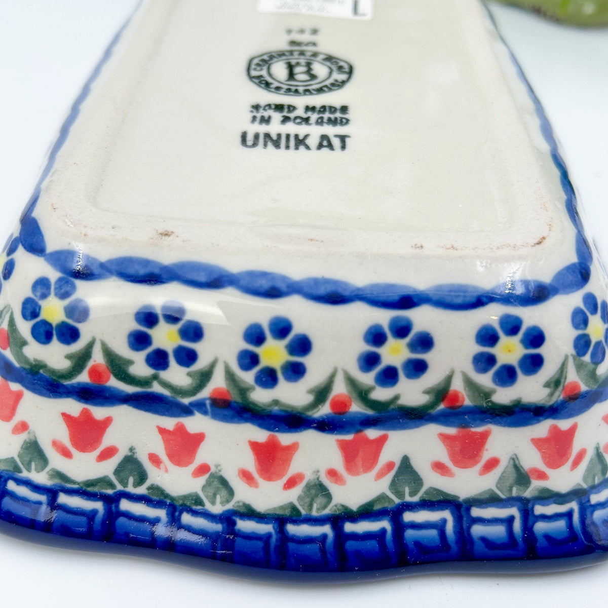 rectangular 8” baker with red poppy flowers is made by talented artisans