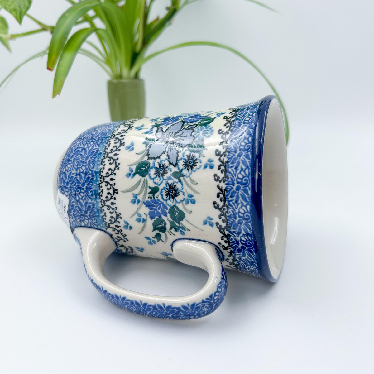 Rhapsody in Blue bistro mug tipped on its side showing interior and handle