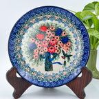 UNIKAT Hummingbird Bouquet plate, front view displayed on wooden stand showing full bouquet and hummingbird