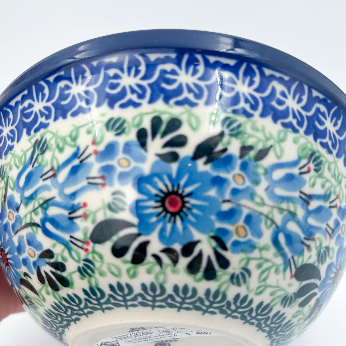 Close-up of interior floral pattern on Windswept Blues bowl
