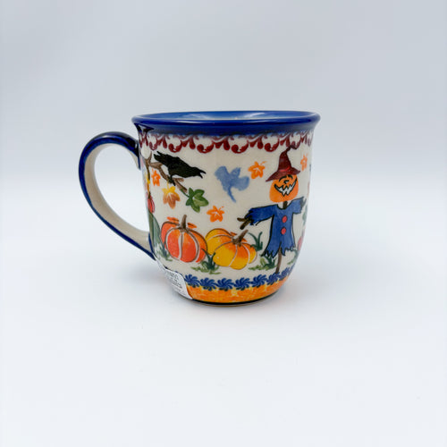 Pumpkin Scarecrow Viking mug on white background, front view showing crow and scarecrow