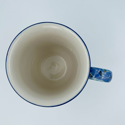 17 oz Polish Pottery UNIKAT floral  bistro mug is made by talented artisans from Poland.  Dimensions 5.12" x 3.98" X 5.08"  Ceramika Artystyczna Company