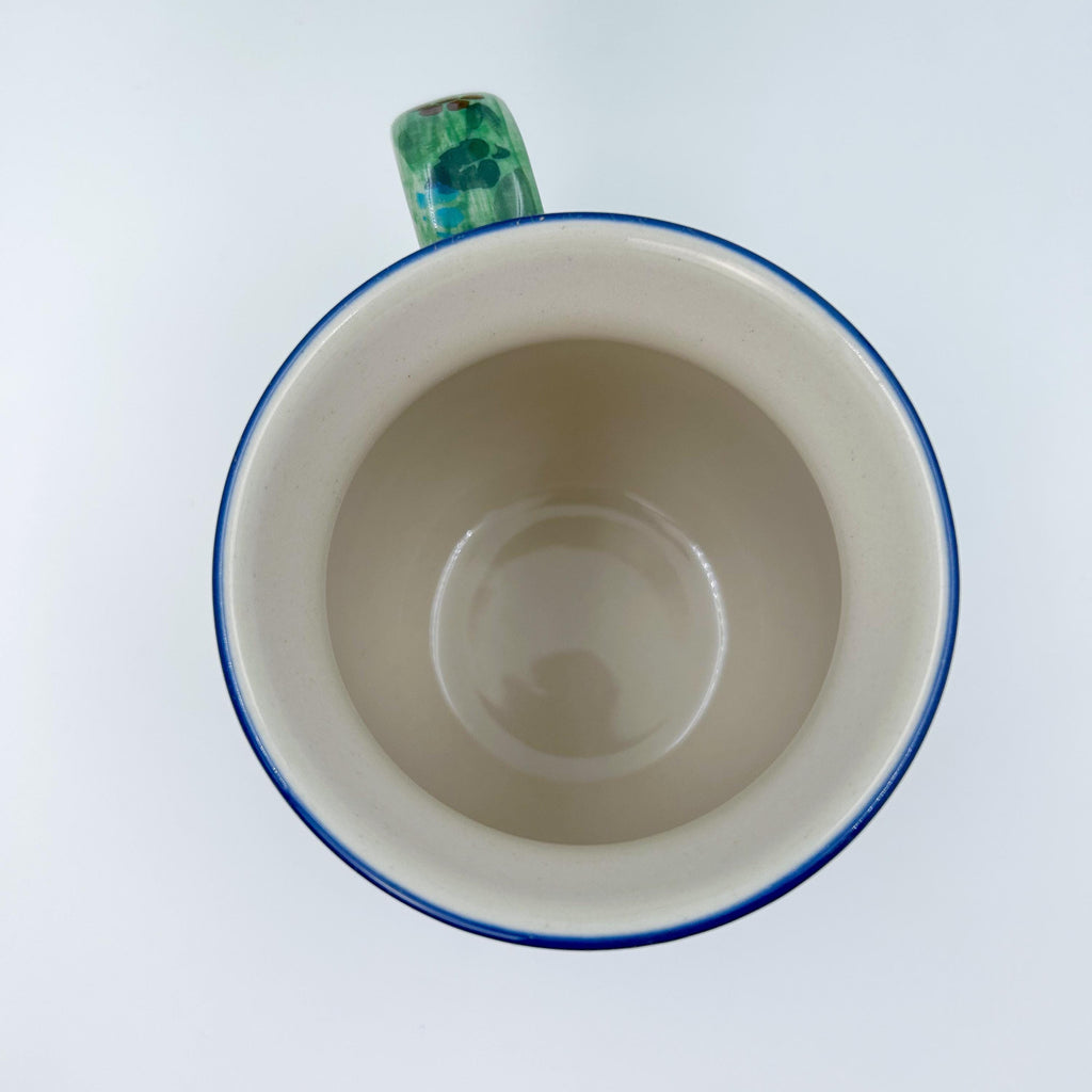 Top-down view into Garden Delight bubble mug showing cream interior