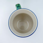 Top-down view into Garden Delight bubble mug showing cream interior