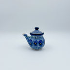 5oz Creamer with lid.  UNIKAT Deep Winter Design
