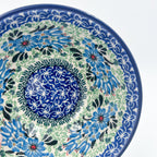 Close-up angled view of center medallion on Windswept Blues bowl