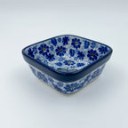 Misty Dragonfly square bowl, front view showing dragonfly and blue floral pattern on square rim