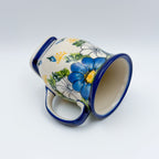 Blue Petal Dance tulip mug tipped on its side showing interior and pattern