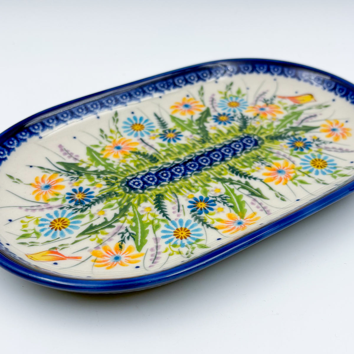 UNIKAT Wildflower Meadow oval platter, angled front view showing wildflower spray on oval tray