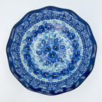 Deep Winter scalloped bowl on white background, top-down straight-on view