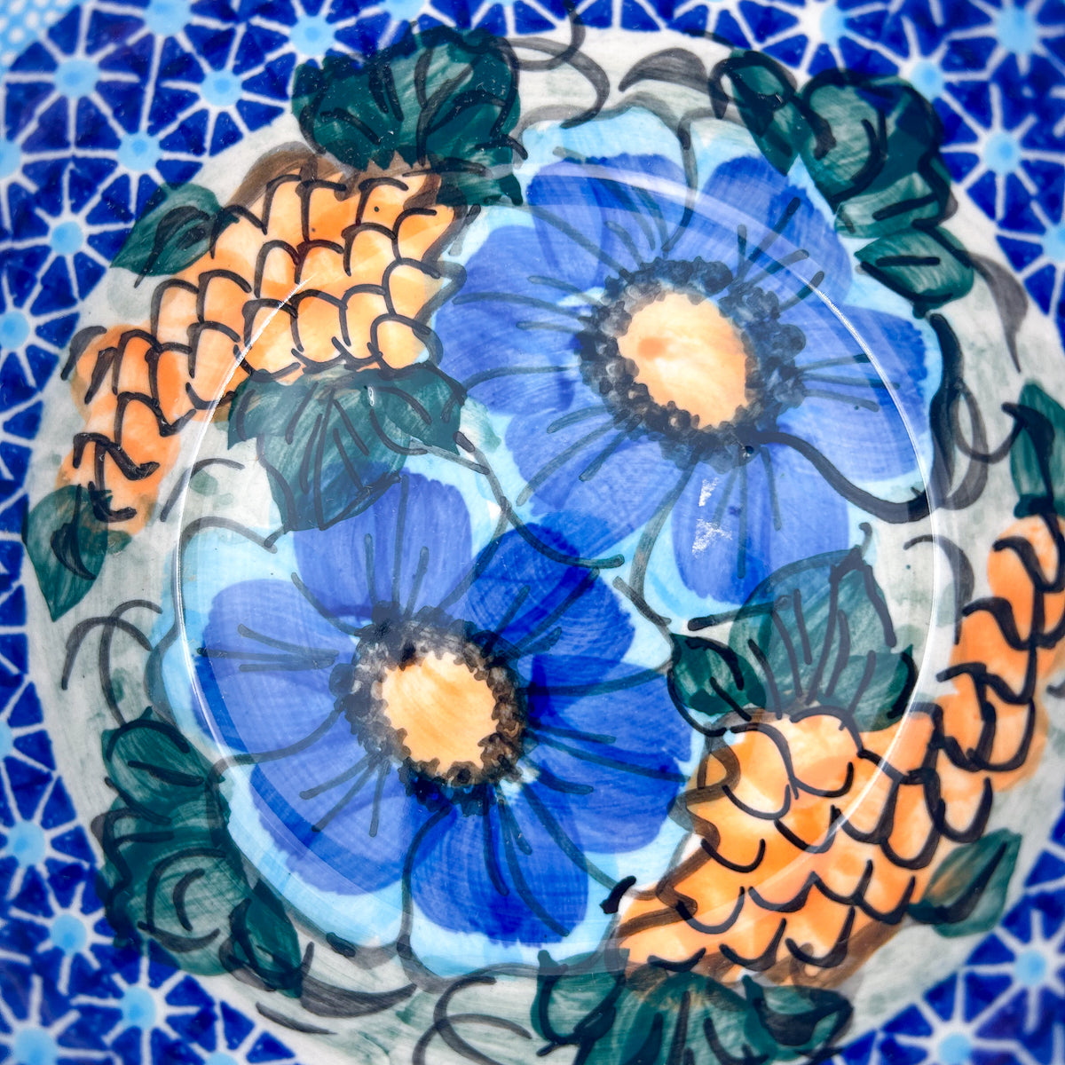 Corn in the Blue deep bowl, top-down straight-on view of interior medallion