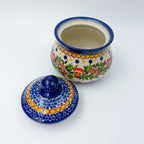 Iza sugar bowl, Mushroom Design, lid removed beside open bowl showing interior and mushroom wreath