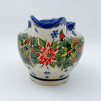 UNIKAT Cardinal Winter gravy dish, front view showing poinsettia bouquet, cardinal, and pinecones