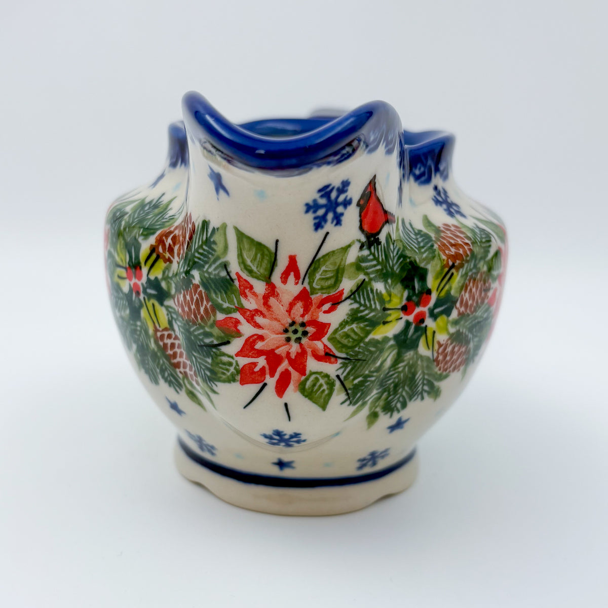 UNIKAT Cardinal Winter gravy dish, front view showing poinsettia bouquet, cardinal, and pinecones