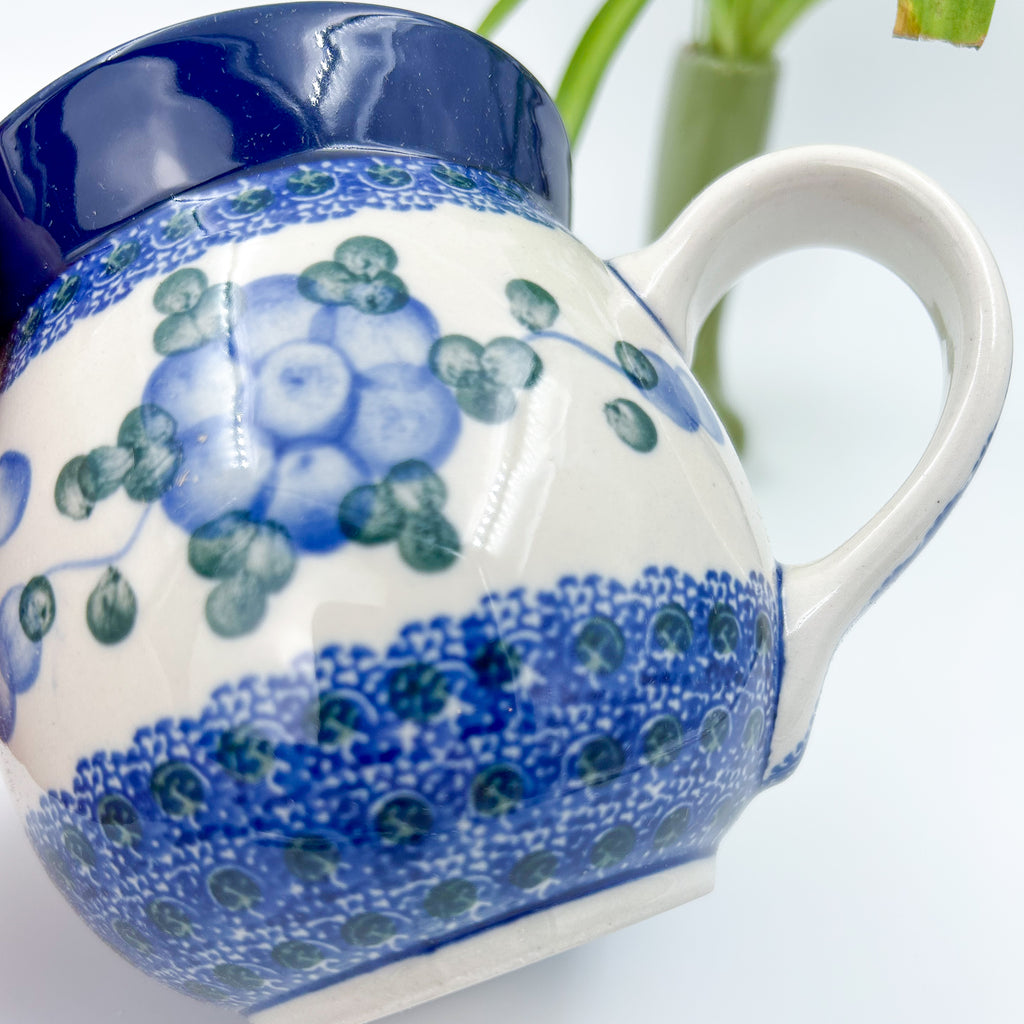 This 12 oz Polish Pottery ceramic floral bubble mugolds 12 ounces of fluid.
Ceramika Artystyczna Company
