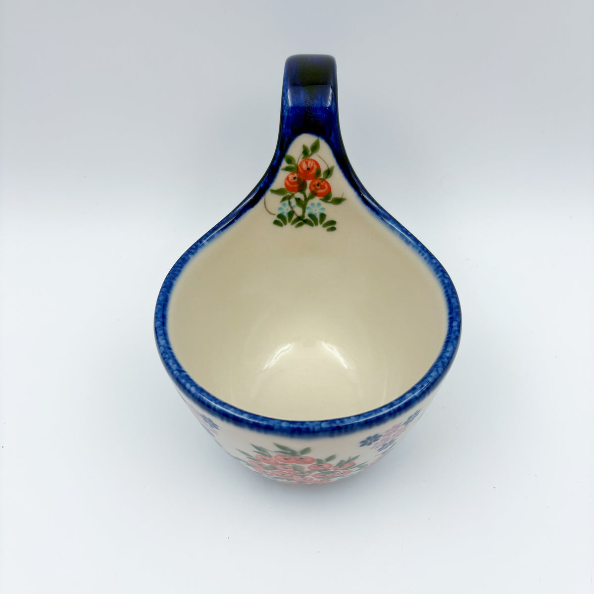 Red Berry loop-handle bowl mug, angled view showing interior
