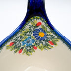 Close-up of interior floral bouquet on Garden Poppy loop-handle bowl mug