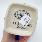 Bottom of Wildflower Meadow tulip mug showing Kalich hand-made stamp and signature