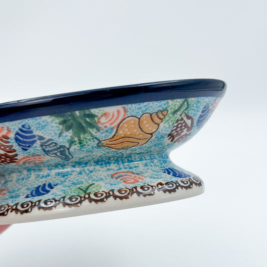 This 6” Polish pottery soap dish. UNIKAT Ocean Whisper pattern, that is hand painted with shells and aquatic life.
Ceramika Artystyczna Company
5.75" X 3.86" x 1.81"